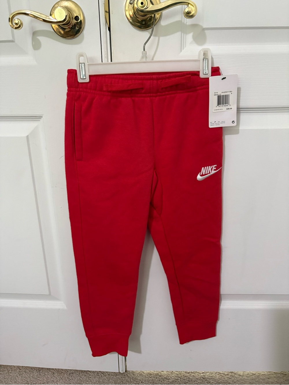 Nike Red Kids Fleece Joggers with White Swoosh